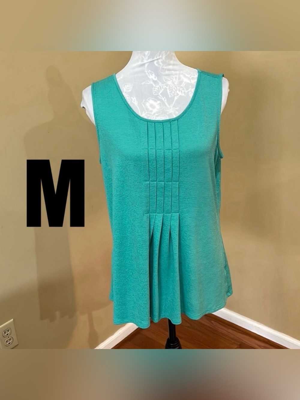 Green pleaded sleeveless top from Croft & Barrow